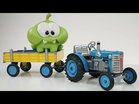 ДЕДУШКА СИНЕГО ТРАКТОРА - Видео распаковка unboxing для детей про заводной синий трактор с прицепом - Популярные видеоролики!